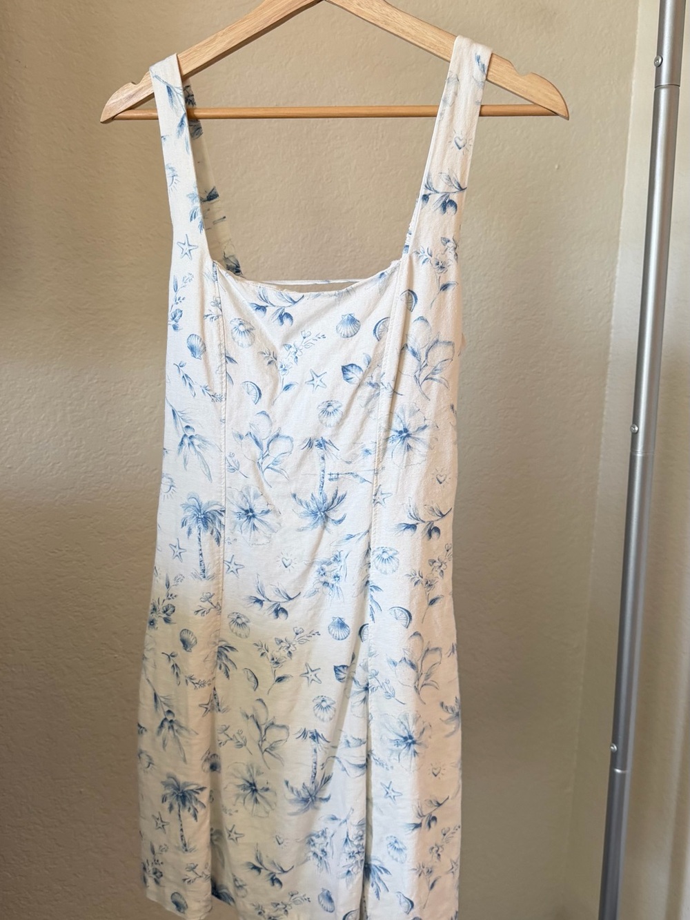 Hollister blue & white floral mini dress with tie back detail. Size S